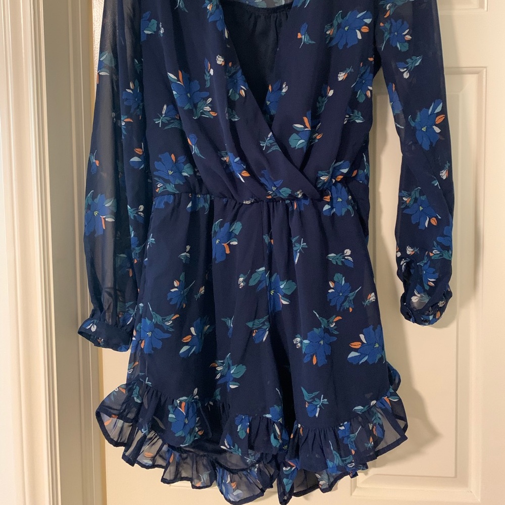 Adorable romper with ruffle trim sz M-L